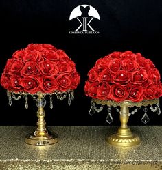 two red roses are sitting on top of each other