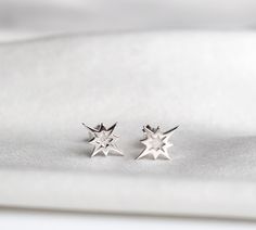 Sterling Silver Polaris Ear Studs Beautiful stud earrings in 925 sterling silver - SOLD AS A PAIR The earstuds can be worn on every occasion and are also perfect to combine with your other favourite earrings.  Details: * 925 Sterling Silver * Sold as a Pair Design: * Polaris Star - 7mm x 10mm For hygienic reasons, earrings cannot be exchanged or returned! Sterling Silver Star Earrings In White Gold, White Gold Star-shaped Sterling Silver Earrings, Polaris Star, Studs Piercing, Northern Star, Earrings Star, Star Stud Earrings, Star Earrings Stud, Earrings Ear