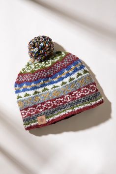 This nordic pom pom beanie is cozy, and the fleece lining makes it comfortable. Whether you are snowboarding, snowshoeing, cross country skiing, or just exploring the world this wool beanie will keep you warm in style. Check out our matching Nordic Wool Mittens to make a perfect pair, look no further for the perfect gift! Year 9, Wool Mittens, Wool Clothing, Wool Beanie, Exploring The World, Cross Country Skiing, Snow Shoes, Pom Beanie, Cross Country