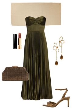 a woman in a green dress and accessories