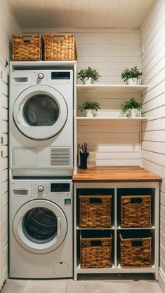 a washer and dryer in a laundry room with baskets on the shelf next to it