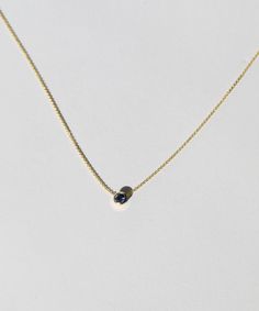 Blue sapphire set in a bezel, on a gold chain. Specifications: 4mm blue sapphire in 14k gold, 16"14k yellow gold chain. Wide Band Engagement Ring, Band Engagement Ring, Sapphire Necklace, Yellow Gold Chain, Emerald Jewelry, Salt And Pepper Diamond, Sapphire Jewelry, Pendant Bracelet, Mens Wedding Bands