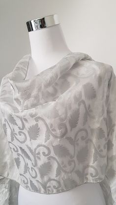 Silver Shawl with silver floral pattern on a light brocade type fabric. Elegant wrap, beautifully made with matching silver borders, very lightweight.  Keep it or gift it. Size is approx. Silver Shawl, Silver Scarf, Wedding Wraps, Silver Wedding, Scarf Wrap, Borders, Scarf Accessory, Shawl, Floral Pattern