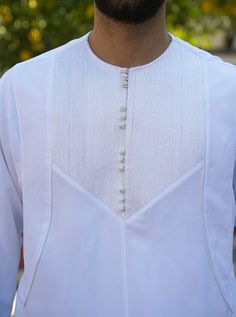 Full length Round neckline Chest opening with ball buttons and loops Side-slit pocket 2 bottom side slits Twine embroidery on chest Model is 184cm (6 feet) and wearing size L Item Code: mG0903 Latest Kurta Designs, Haldi Decoration, Hoodie Design Ideas, Men's Closet, Arab Men Fashion, Gents Kurta Design, Gents Kurta, Chest Opening, Latest African Men Fashion