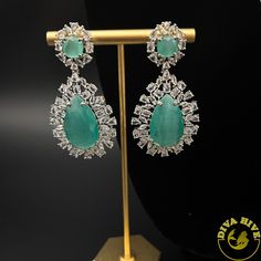 This gorgeous two layer set is made of AD/CZ which is perfect for wedding ,reception and party wear. Quality guaranteed Contain: Necklace , Earing, Nickel Free Polish : Silver Metal : Brass Perfect for all big occasion Designer wear Handcrafted Dazzling Hand Set Bridal Earrings For Party, Silver Bridal Sets For Party, Cubic Zirconia Jewelry Sets With Stone Setting For Party, Elegant Bridal Earrings With Stone Work In Cubic Zirconia, Elegant Party Jewelry Sets With Stone Setting, Diamond Bridal Sets For Party, Elegant Stone Work Jewelry Sets For Formal Occasions, Diamond Bridal Necklace With Stone Work For Parties, Elegant Formal Jewelry Sets With Stone Work