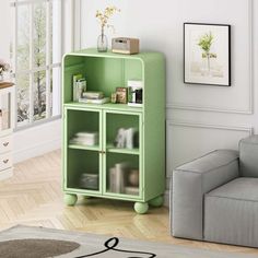 a living room with a couch, chair and book shelf