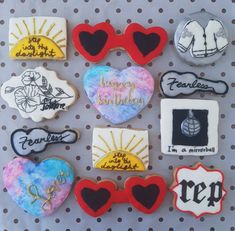 decorated cookies are arranged on a polka dot surface