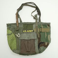 Vintage original remake army bag which was used the original military garment. One of kind and handmade. Very durable and easy to use. It is the only original bag in the world. Military Bags With Multiple Pockets For Everyday Use, Military Style Bags With Multiple Pockets For Everyday Use, Military Style Bags With Pockets For Everyday Use, Military Style Everyday Bag With Pockets, Military Green Bags With Pockets, Military Style Green Bags With Pockets, Military Style Khaki Bags For Everyday Use, Military Style Green Bag For Everyday Use, Military Style Canvas Bag With Pockets