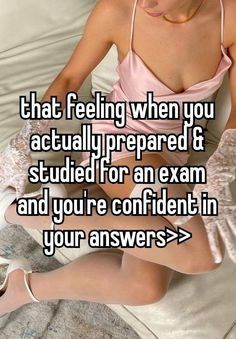 a woman sitting on top of a bed with her legs crossed and texting that feeling when you actually prepared & studded for an exam and you're confident in your answers