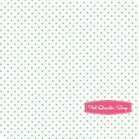 a white polka dot paper with pink border