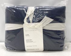 a package wrapped in blue and white paper