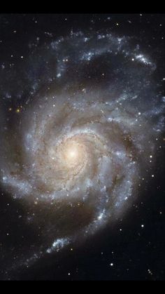 an image of a spiral galaxy in the sky