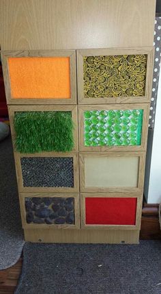 an assortment of different colored carpet samples on display