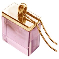 This contemporary pendant necklace features a 15x15x8 mm natural untreated pink tourmaline cut specifically for the artist by the oldest company in Germany, in the market since the 19th century. The pendant belongs to a collection that was featured in Harper's Bazaar and Vogue UA, and it is made of 14 karat rose gold. The piece reflects the art deco spirit and is suitable for both women and men. It can inspire architects, designers, and artists alike. The pendant is big and draws attention to th Big Pendant Necklace, White Diamond Necklace, White Gold Pendant Necklace, Contemporary Pendant, Pink Topaz, Tourmaline Necklace, Harper's Bazaar, Harpers Bazaar, Pink Quartz