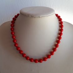 Vintage Czech vivid red coral glass beaded necklace. Length: 16 inches; ball beads: 7 mm. good vintage condition - sold as is -return not accepted.  To make this a smooth and pleasant transaction experience for everyone, all buyers need to read and understand the description, the terms of sale , the payment and the shipping indicated in this listing. Return not accepted - please ask before purchase. Thank you for watching our other items! Formal Red Coral Beaded Necklace, Red Vintage 8mm Bead Necklaces, Classic Red Round Beaded Necklaces, Red Vintage Necklaces With 8mm Beads, Classic Red Beaded Necklace As Gift, Classic Red Single Strand Beaded Necklace, Red Vintage Necklace With 8mm Beads, Classic Red Beaded Necklace For Gift, Red Round Beads For Formal Occasions