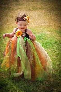 This dress is perfect for pictures at the pumpkin patch, Thanksgiving, or a Scarecrow costume for Halloween! It comes with a matching headband. Dress is made with a crocheted top with individual tulle strands tied on. The tulle is double layered but does not have an underlayer. Bloomers or leggings may be needed. Tulle colors: Brown, gold, green, and Sparkling Orange Scarecrow Tutu, Thanksgiving Tutu, Halloween Tutu Dress, Scarecrow Costume, Halloween Tutu, Fall Scarecrows, Pumpkin Patch Outfit, Tutu Dresses, Homemade Costumes