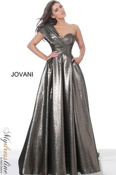 Looking for a glamorous ballgown to make a statement at your next formal event? Check out the Jovani 04170 one shoulder evening gown! This show-stopping dress features a single strap design, ruched bodice, and flowy skirt that is sure to turn heads. Whether you're attending a wedding, gala, or prom, this dress is perfect for making an entrance. Plus, the pretty blush color is perfect for any season. Shop today and get free shipping on orders over $100! Jewel Neck Dress, Jovani Dresses, Sleeveless Gown, A Line Gown, Beautiful Gowns, Formal Gowns, Mother Of The Bride Dresses, Stunning Dresses, Formal Wear