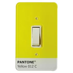 a yellow light switch cover with the word pantone written on it in white lettering