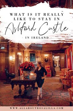 a woman standing in front of a table with flowers on it and the words what is it really like to stay in nifford castle in ireland