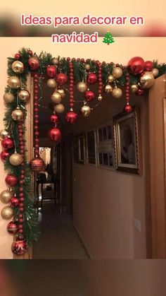 a hallway decorated for christmas with ornaments