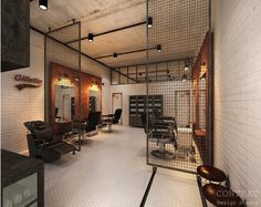 the interior of a hair salon with chairs and mirrors