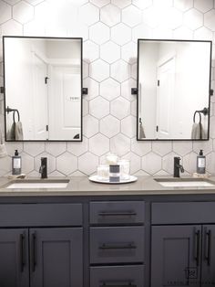 an instagram page with two sinks and mirrors on the same wall, one is dark gray