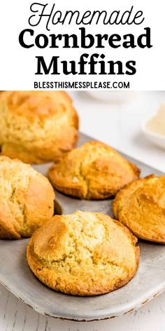 homemade cornbread muffins on a baking sheet with text overlay that reads homemade cornbread muffins