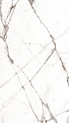 a white marble floor with cracks and lines