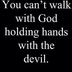 a black and white photo with the words you can't walk with god holding hands with the devil