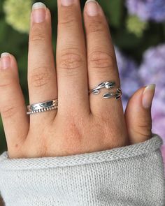 Sterling Silver Tulip with Leaves Wrap Ring | The Life Divine Flower detail measures approximately 1/2" H x 1 1/2" W Dainty Anniversary Rings For Spring, Dainty Spring Anniversary Rings, Spring Flower Promise Ring, Spring Promise Ring With Open Ring Shape, Adjustable Sterling Silver Ring For Spring, Spring Promise Ring With Open Design, Adjustable Flower Promise Ring For Spring, Spring Open Ring For Promise, Adjustable Flower Ring For Spring Anniversary