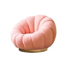 a pink chair sitting on top of a wooden base