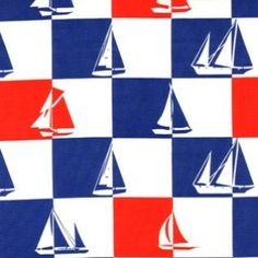 a red, white and blue checkerboard pattern with sailboats on the side