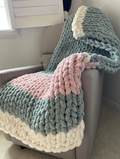 a chair with a blanket on top of it