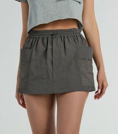 Jet set to your next destination in this edgy-cute cargo mini skort perfect for road trips or travel! The skort is designed with a functional elasticized high-rise waist with a drawcord, a form-hugging fit, and trendy side cargo pockets to keep your phone or lipgloss handy. Crop Zip Up Hoodie, Bridesmaids Heels, Damas Dresses, Dress Satin Bridesmaid, Bridesmaid Dresses Satin, Beach Wedding Guest Dress, Sequin Bridesmaid Dresses, Cocktail Outfit, Cropped Zip Up