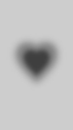 a black and white photo of a heart shaped object