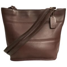 Dark Brown Mahogany Leather. Brass Hardware. Handle Drop 11 3/4''. Zipper Closure. Inside Zipper And Slide Into Pockets. Size; W 11 1/2'' X H 9 1/4'' X D 4 1/2''. Made In The United States. # M7c-9098 Coach Vintage Tribeca Slim Bucket 9098 Leather. 2201420/400 Bigclcbr Last Photos Are To Give You An Idea Of Size. I Have Taken The Time To Clean This Bag Inside And Out, Conditioned And Sheen. Coach Motto; The Scars, Scratches, Veins And Wrinkles Are Natural Marking Characteristics Of Full Grain Leather. Light Scuffs Throughout. Has A Split/1/2 Hang Tag. Overall In Very Good Vintage Condition. Silver Platforms, Coach Belt, Coach Tote, Brown Leather Shoulder Bag, Dark Brown Leather, Vintage Coach, Hobo Handbags, Gold Leather, Leather Satchel