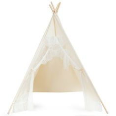 a white teepee with lace on it