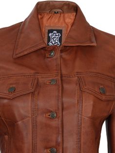 Introducing our women's cognac brown Leather Trucker Jacket - a must-have for the fashion-conscious woman. Crafted from high-quality leather, it offers durability and a chic, casual design. Stay comfortable with its warm polyester lining. The timeless shirt collar and eye-catching cognac color make it versatile and easy to pair with any outfit. Elevate your style today. Specification: 100% real lambskin leather Internal soft polyester lining Front zip closure, and shirt collar Ribbed hem and cuf Womens Brown Jacket, Leather Trucker Jacket, Asymmetrical Leather Jacket, Maroon Leather Jacket, Leather Jacket For Women, Black Leather Blazer, Tan Leather Jackets, Black Leather Moto Jacket, Women Trucker