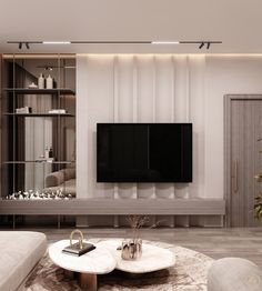 a modern living room with white furniture and a flat screen tv