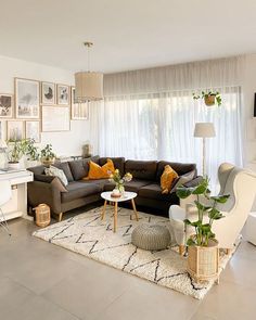 a living room filled with furniture and decor