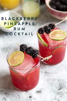 two glasses filled with blackberry pineapple rump cocktail