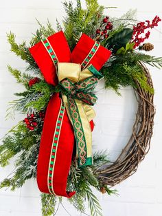 a christmas wreath hanging on the wall