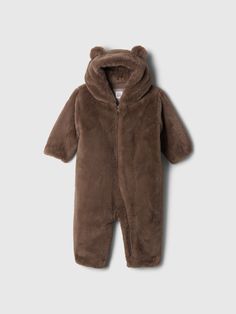 Soft, faux fur one-piece.  Hooded neckline with bear ear appliques.  Long sleeves.  Zipper front.  Jersey lining.  For more fit and sizing info, check out our Size Guide. Bear Costume Toddler, Baby Bear Outfit, Plymouth Rock, Bear Costume, Bear Ears, Toddler Christmas, Baby Bear, Appliques, Baby Toddler