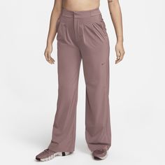 Move beyond the gym in comfort and style in these loose-fitting trousers. Feather-light, with plenty of stretch, their moisture-wicking fabric helps keep you dry and cool as it flows with you in all your moves. Front pleats elevate your look and a traditional zip fly lets you change with ease. Relaxed Fit Wide Leg Cargo Pants, Moisture-wicking Wide Leg Activewear For Sports, Nike Full Length Workout Bottoms, Sporty Moisture-wicking Wide Leg Pants, Relaxed Fit Go-dry Solid Pants, Versatile Wide Leg Sports Pants, Versatile Wide-leg Sports Pants, Nike Full Length Bottoms For Gym, Nike Full-length Gym Bottoms