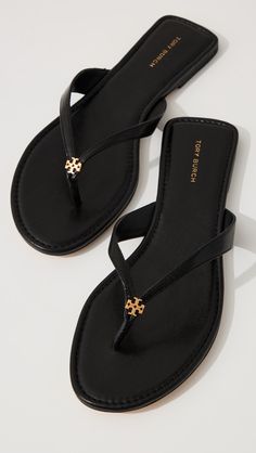 Discover the latest apparel, activewear, shoes & accessories from established and emerging designers. Enjoy free two-day shipping and free returns. Tory Burch Miller Sandals Black, Tory Burch Flip Flops, Soft Sandals, Miller Sandal, Flip Flops Style, Black Flip Flops, Tory Burch Sandals, Logo Emblem, Leather Flip Flops