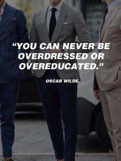 three men in suits standing next to each other with a quote from oscar wilde on them