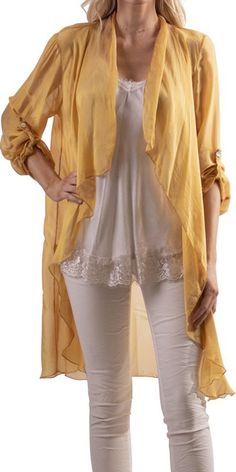 Long draped ilk cardigan with 3/4 sleeve & oyster shell button straps. 40% Silk 60% Viscose Made in Italy One Size Fits Most Model is 5'8" Long Drapes, Silk Cardigan, Oyster Shell, Timeless Fashion, Duster Coat, Mustard, Kimono Top, Coats Jackets, In Italy