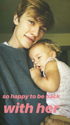 a man holding a small child with the caption so happy to be back with her