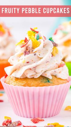 a cupcake with white frosting and fruity pebble toppings on top