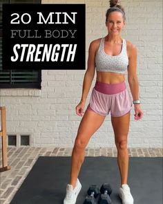 a woman standing on top of a black mat with the words 20 min full body strength